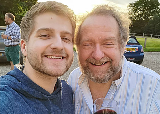 Edward and his dad Nicholas smiling